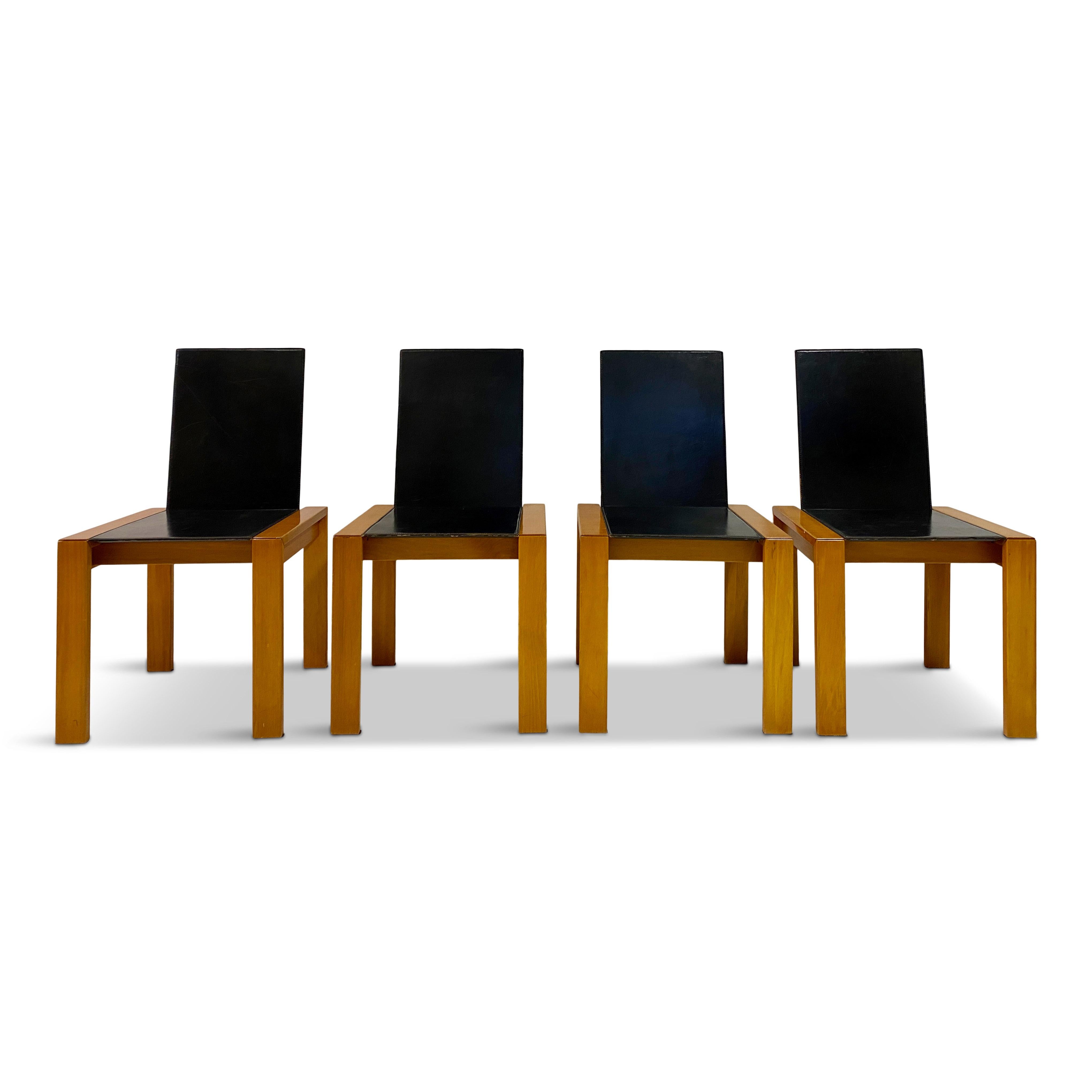 Four dining chairs

Wood frame

Leather seat and back

Seat height 44cm

Italy, 1970s.