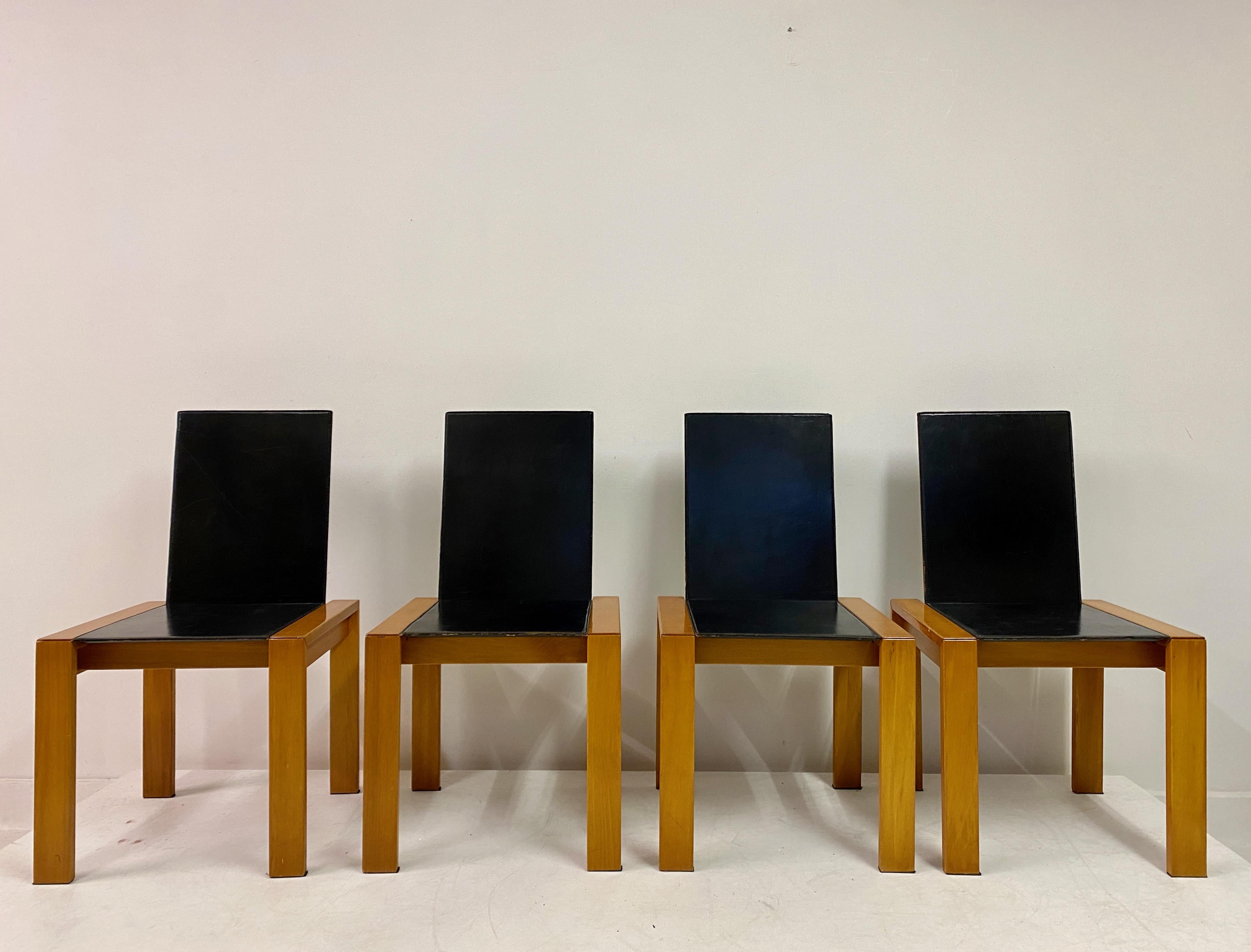Mid-Century Modern Set of Four 1970s Italian Black Leather Dining Chairs For Sale