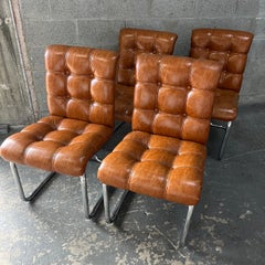 Set of Four 1970s Mid-Century Modern Dining Chairs in the Milo Baughman Style.
