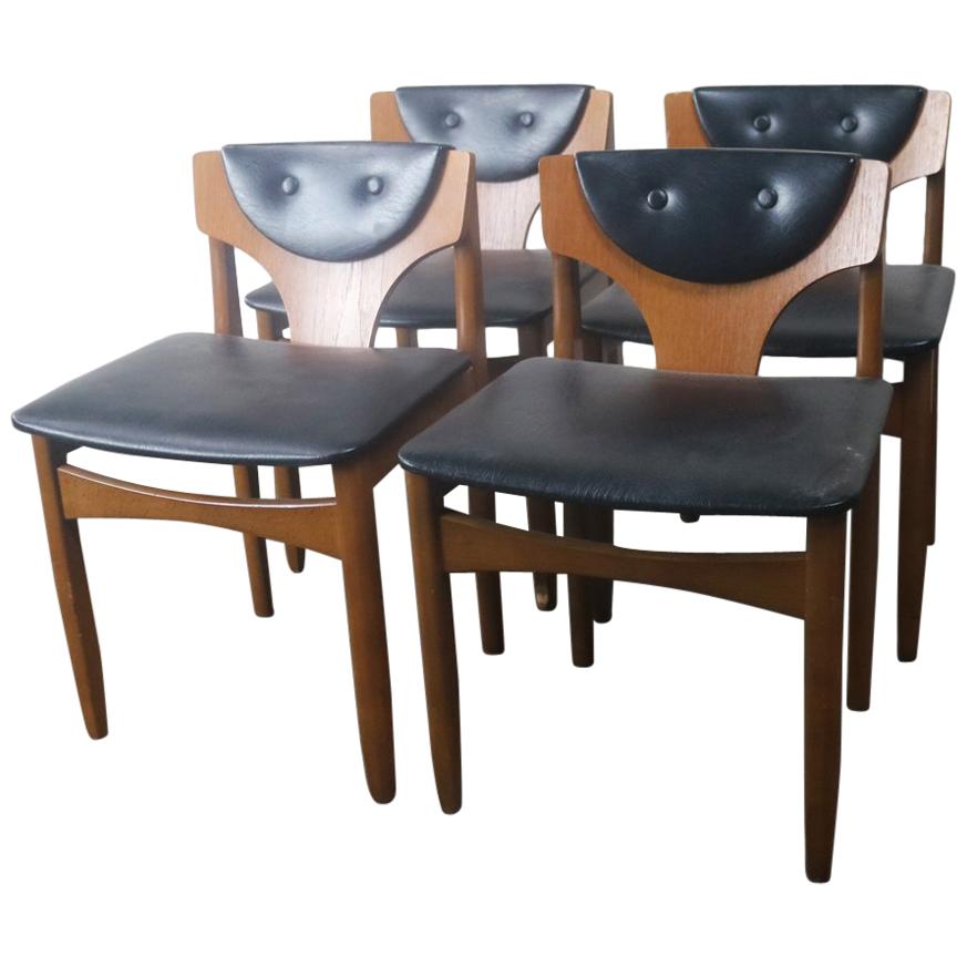 Set of Four 1970s Midcentury German Low Back Black Vinyl Dining Chairs