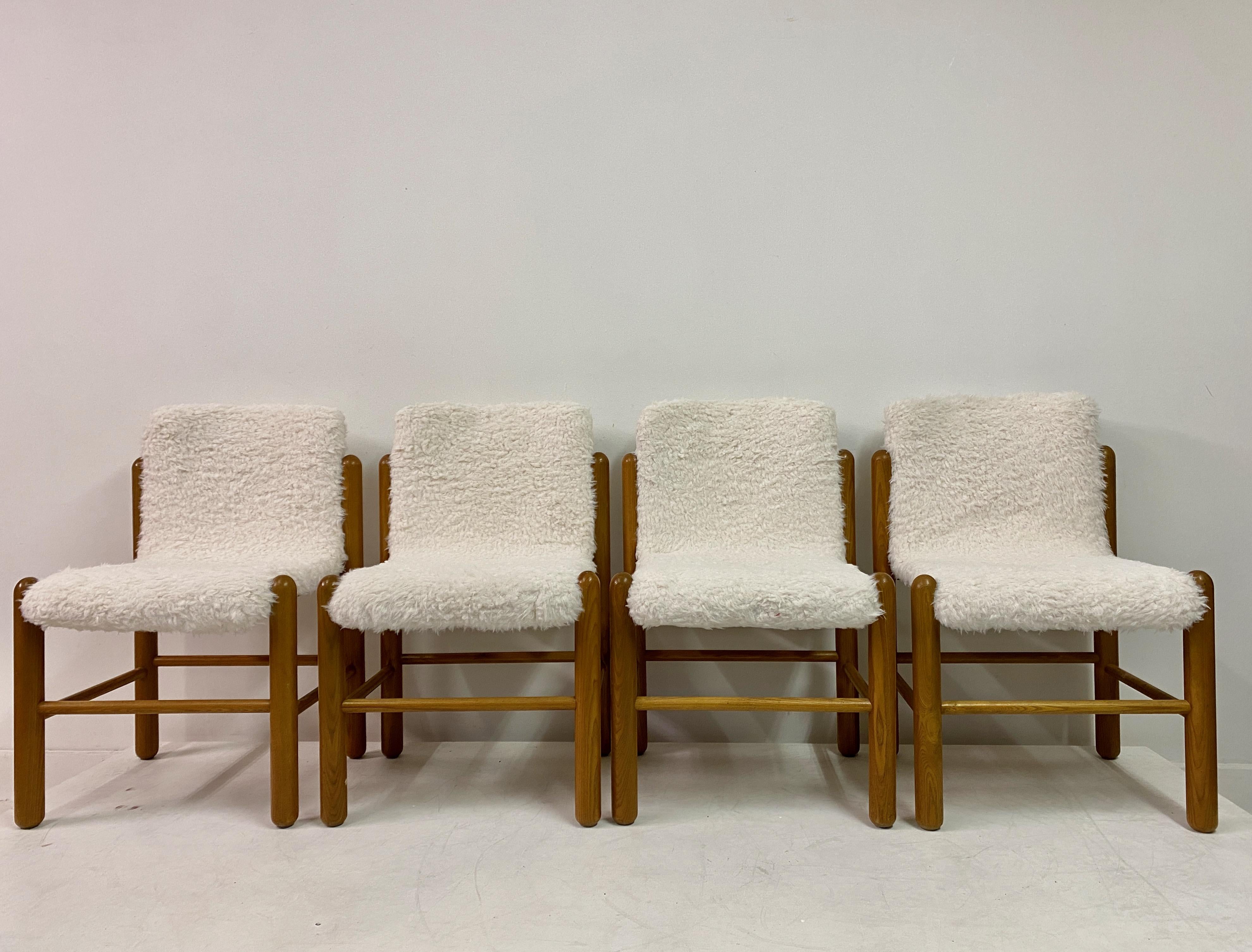 Four dining chairs

Pine frames

Soft faux fur upholstery

Probably Italian 1970s/1980s

Seat height 48cm.