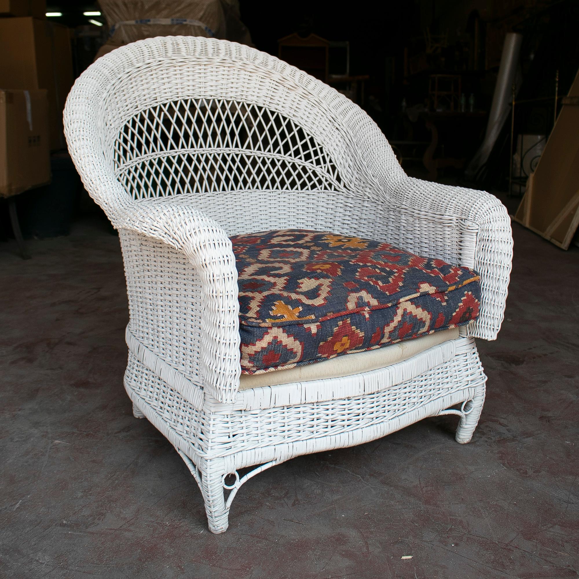 Set of four vintage 1970s Spanish woven wicker white armchairs.