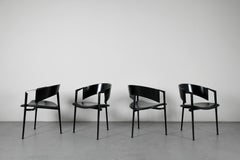 Ensemble de quatre chaises de salle à manger Castelijn SLA des années 1980, cuir noir et Wood