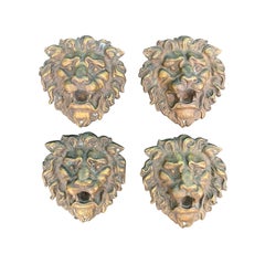 Set of Four 19th-20th Century Bronze Lion Head Medallions