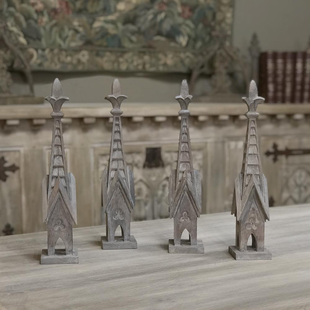 Set of four 19th century carved wood Gothic Spires are great for using as decorative accents, or even placing atop an existing piece of furniture to create a magical transformation! Hand-carved from solid oak to last for centuries,
circa