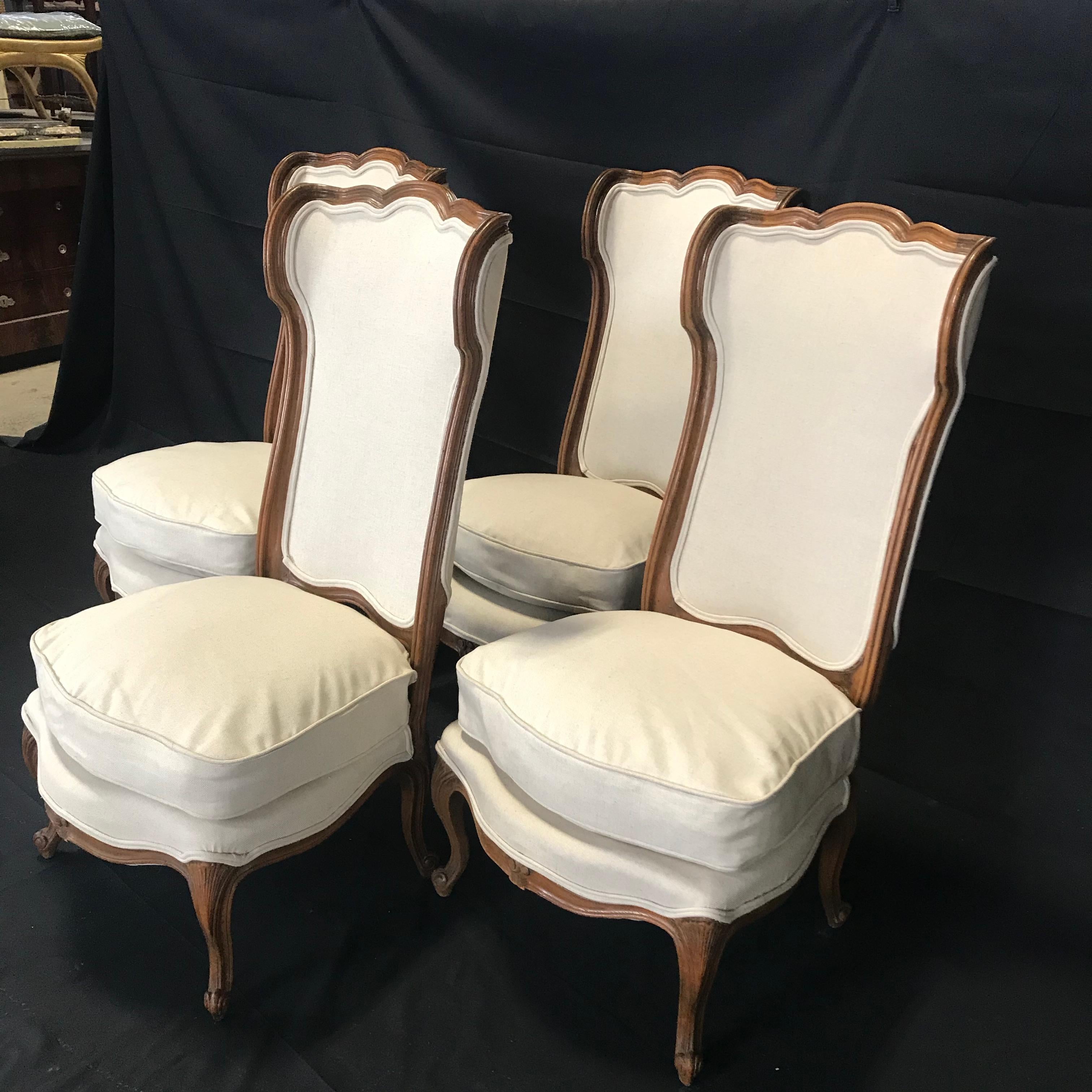 Upholstery Set of Four 19th Century Curvy Elegant French Louis XVI Style Wingback Bergères