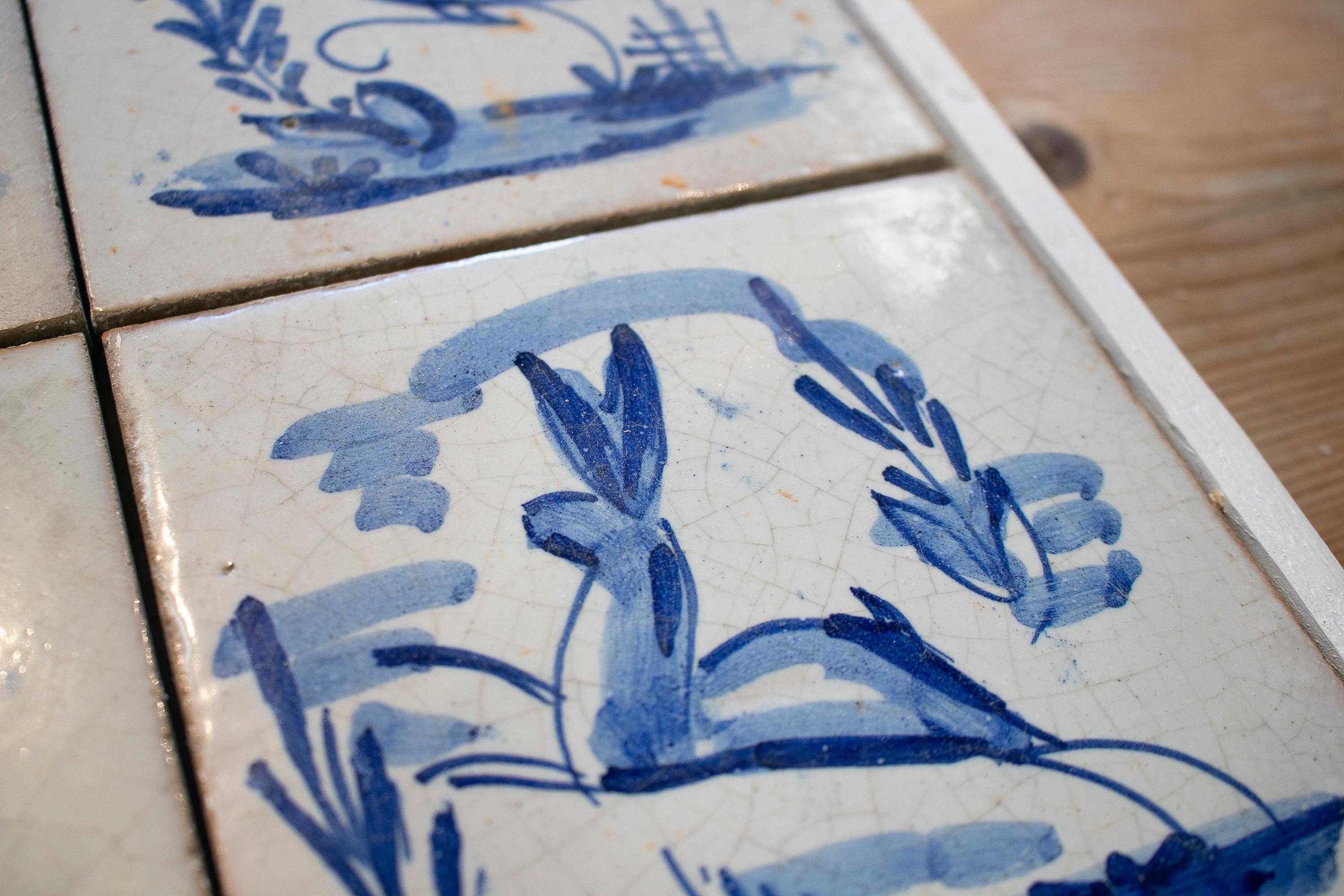 Set von vier niederländischen, handbemalten, glasierten Keramikfliesen aus dem 19. Jahrhundert im Angebot 9