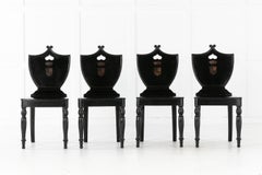 Set of Four 19th Century English Ebonized Hall Chairs