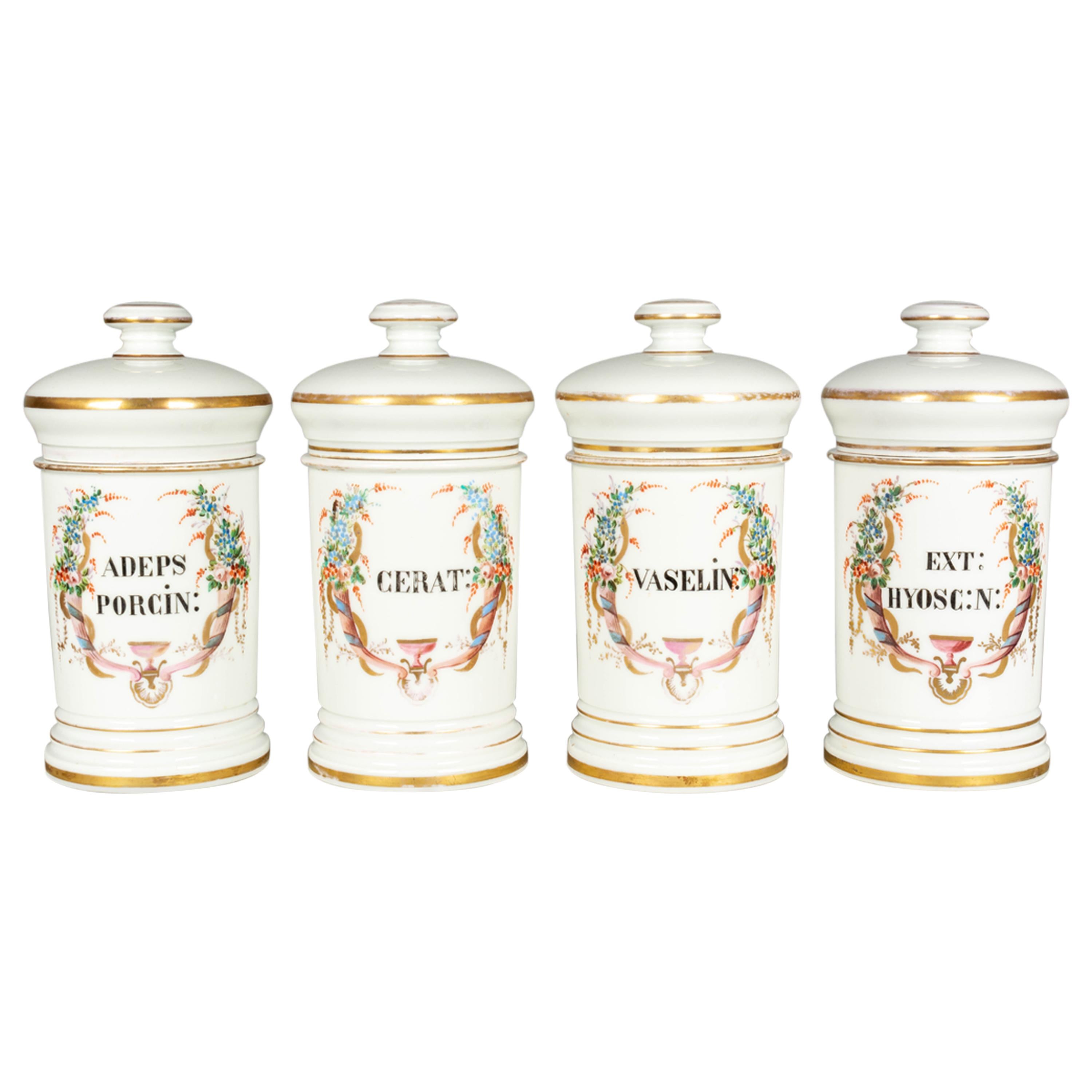 Set von vier französischen Apothekergefäßen aus dem 19. Jahrhundert