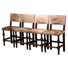 Antique Set of Four 19th Century French Carved Oak, Leather and Cow Hide Bar Stools