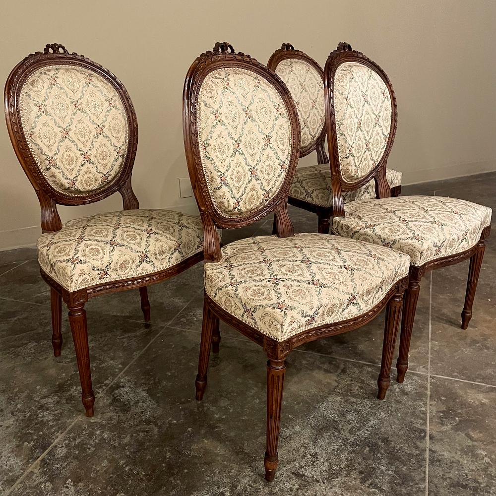 Hand-Carved Set of Four 19th Century French Louis XVI Walnut Chairs For Sale