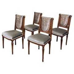 Juego de cuatro sillones de salón franceses Luis XVI del siglo XIX de nogal y mohair