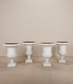 Set of Four 19th Century French Painted Cast Iron Urns