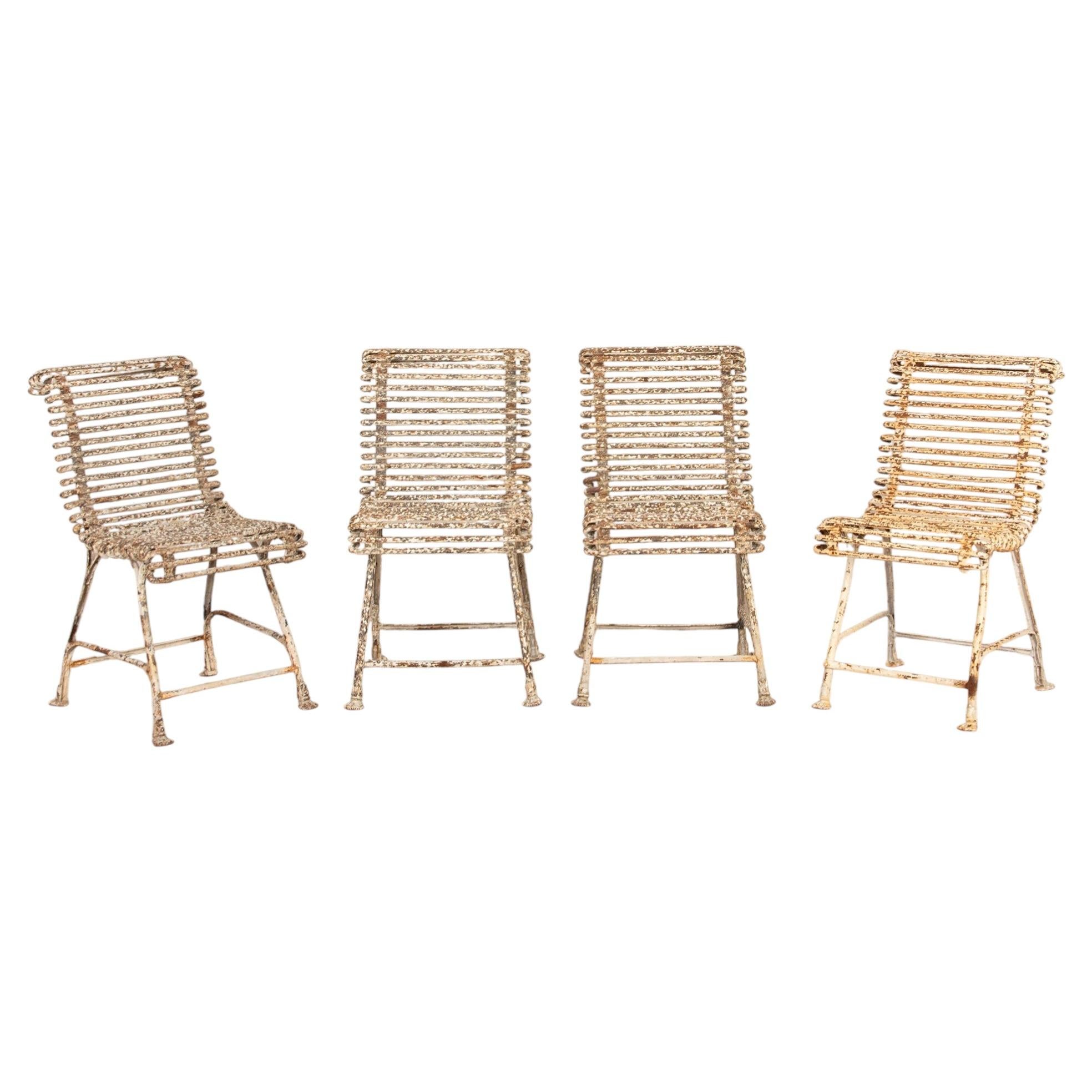 Set of Four 19th Century French Wrought Iron Arras Garden Chairs
