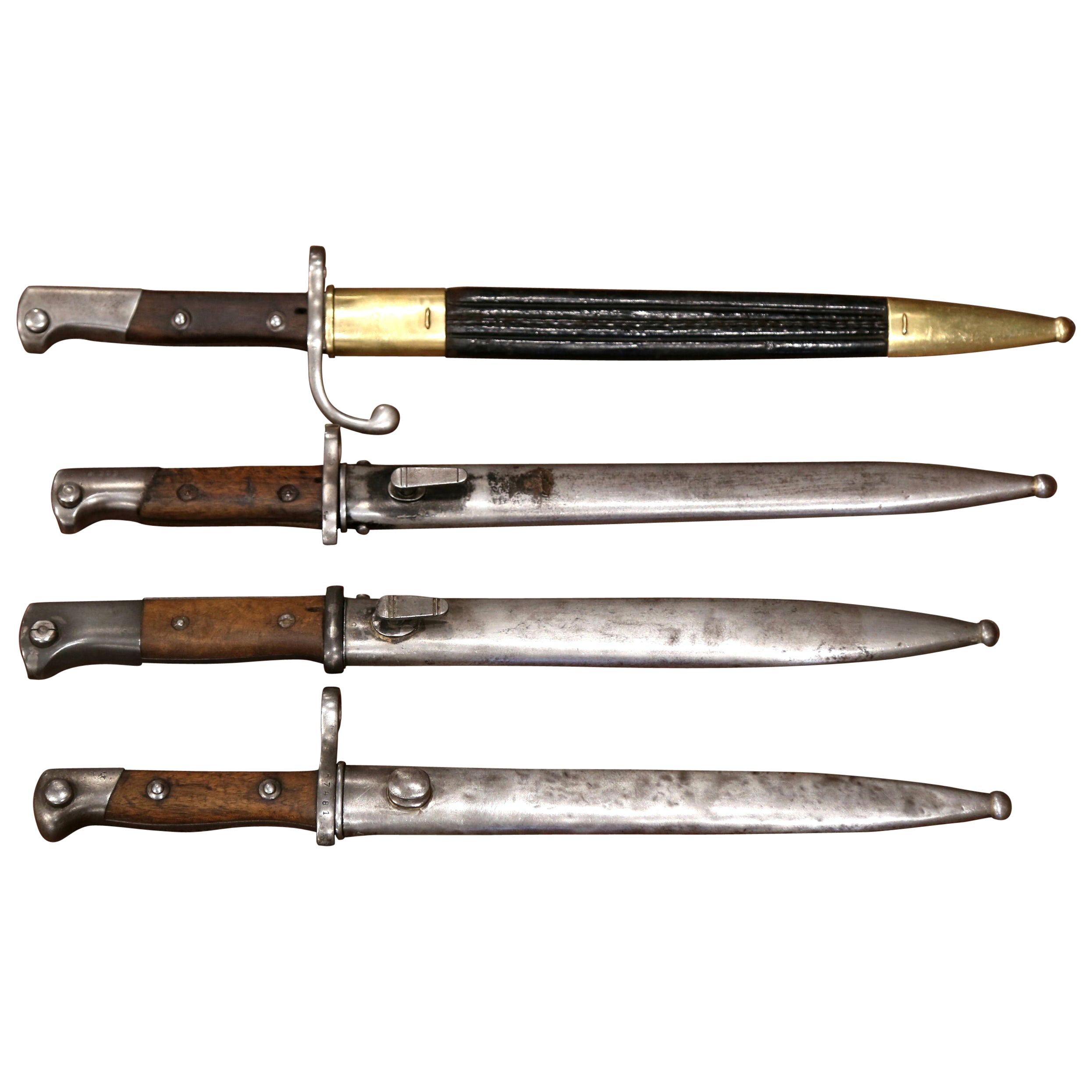 Set of Four 19th Century German Iron Bayonets and Sheaths with Wood Handles