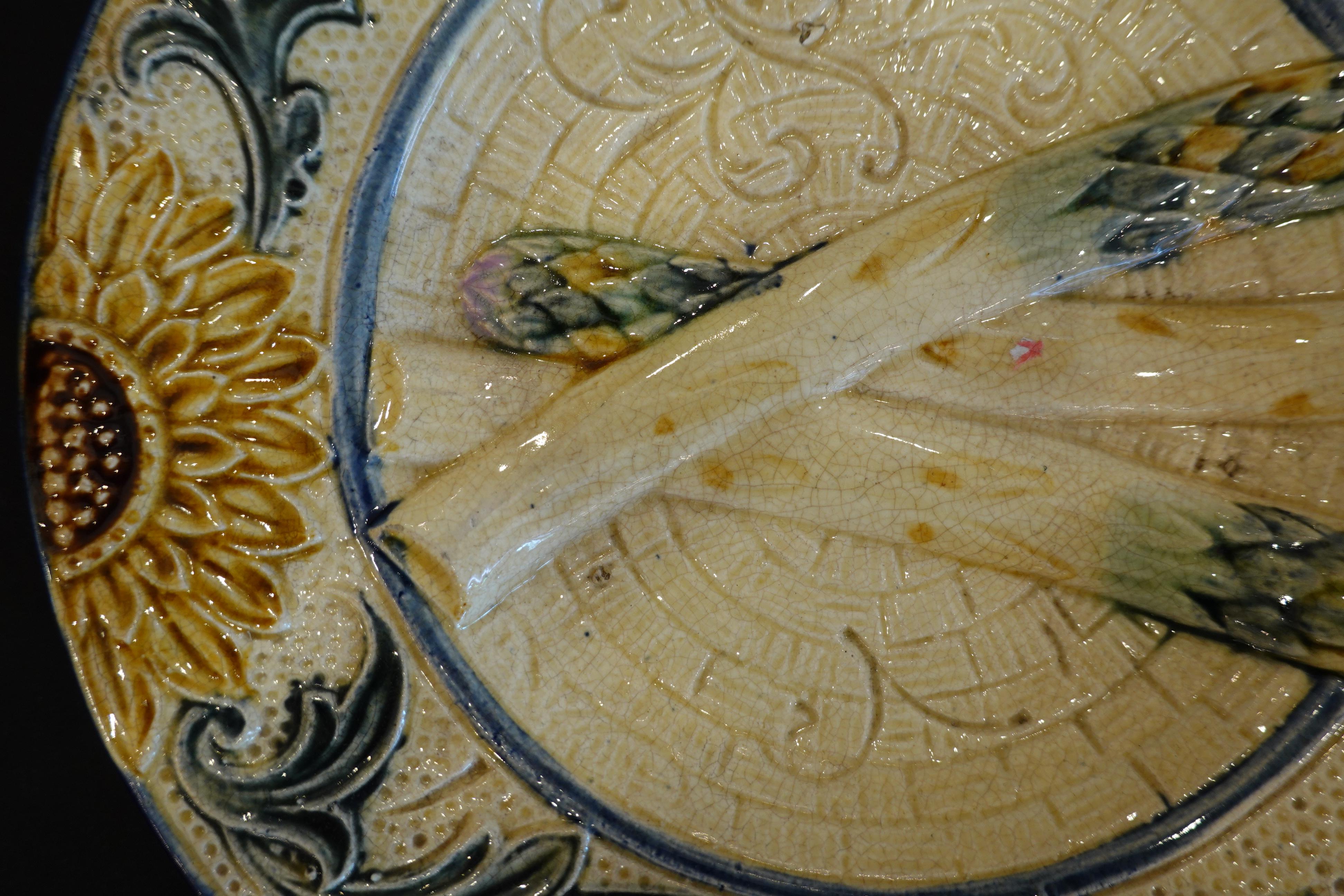 Set of Four 19th Century Majolica Asparagus Plates with Molded Sunflower In Good Condition For Sale In Pembroke, MA