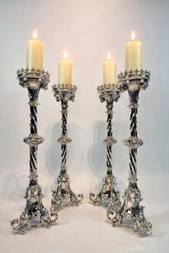 set of four 19th century monumental solid silver candlesticks