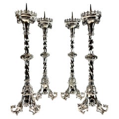 set of four 19th century monumental solid silver candlesticks