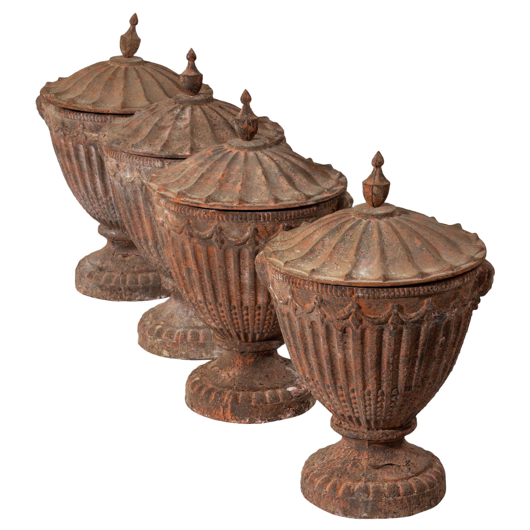 Set of Four 19th Century Neoclassical Cast Iron Garden Urns
