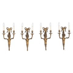 Conjunto de cuatro apliques de ormolu del siglo XIX