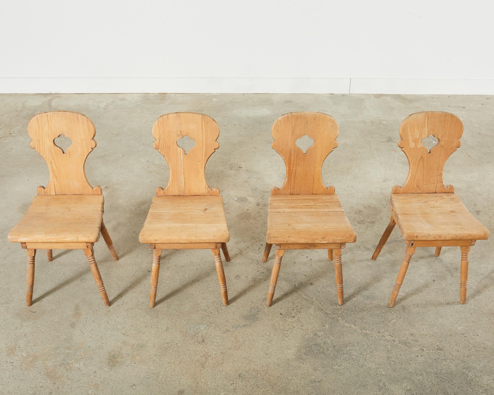 Hand-Crafted Set of Four 19th Century Primitive Swedish Folk Art Pine Chairs For Sale