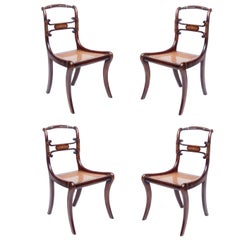 Set of Four 19th Century Regency Rosewood Cane Chairs with Brass Inlay