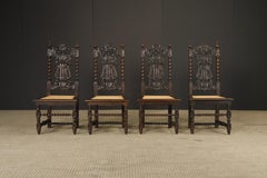Set of Four 19th Century Renaissance Revival Carved Chairs with Cane Seats