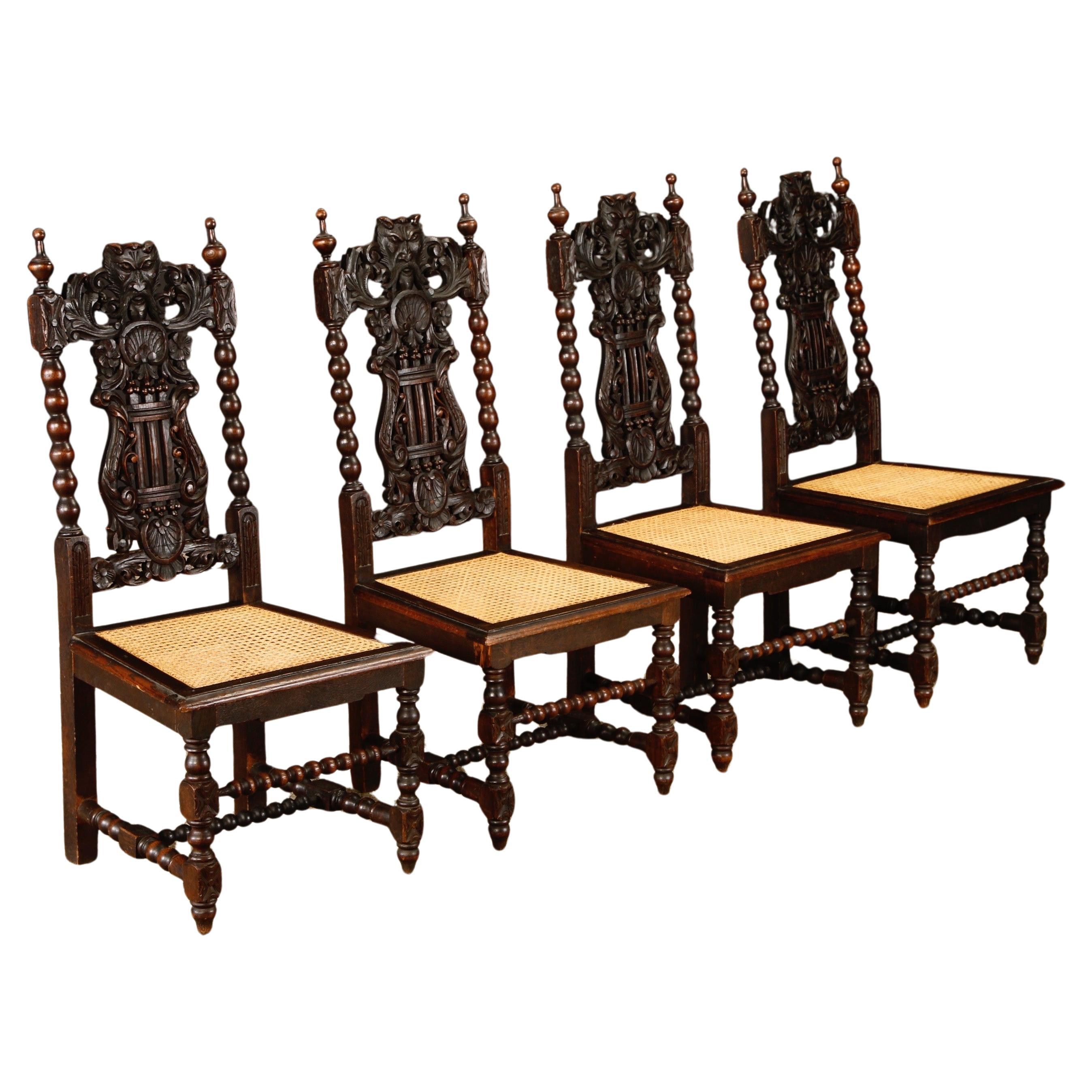 Set of Four 19th Century Renaissance Revival Carved Chairs with Cane Seats
