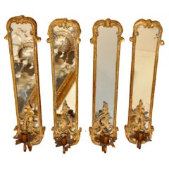 Antique Set of Four 19th Century Rococo Giltwood Mirrored Sconces