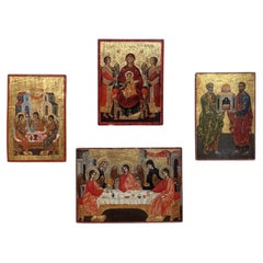 Conjunto de cuatro iconos devocionales rusos del siglo XIX pintados a mano sobre paneles de madera
