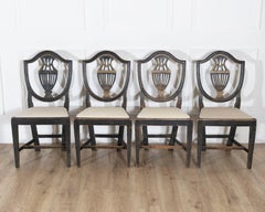 Set of Four 19th Century Swedish Blackened Wood and Gilt Lyre-Back Chairs
