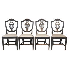 Set of Four 19th Century Swedish Blackened Wood and Gilt Lyre-Back Chairs