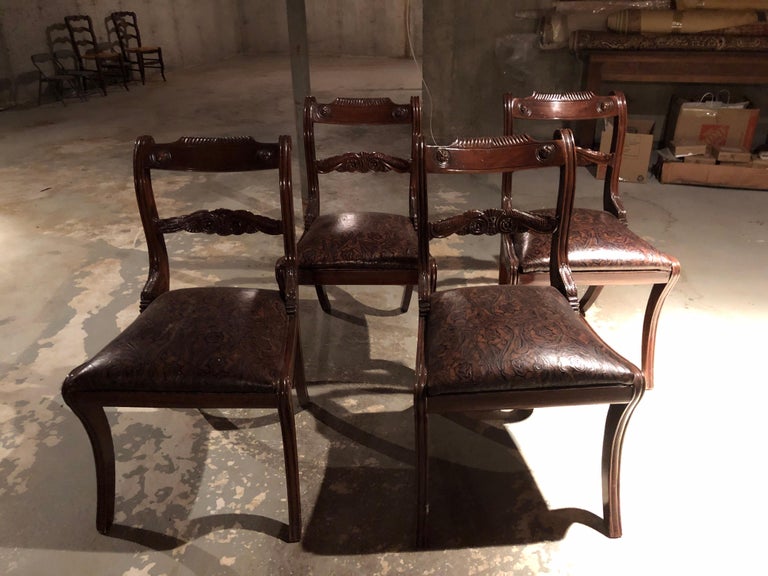 Set of four 19th century Victorian mahogany dining chairs, upholstered in Edelman leather embossed leather seats.