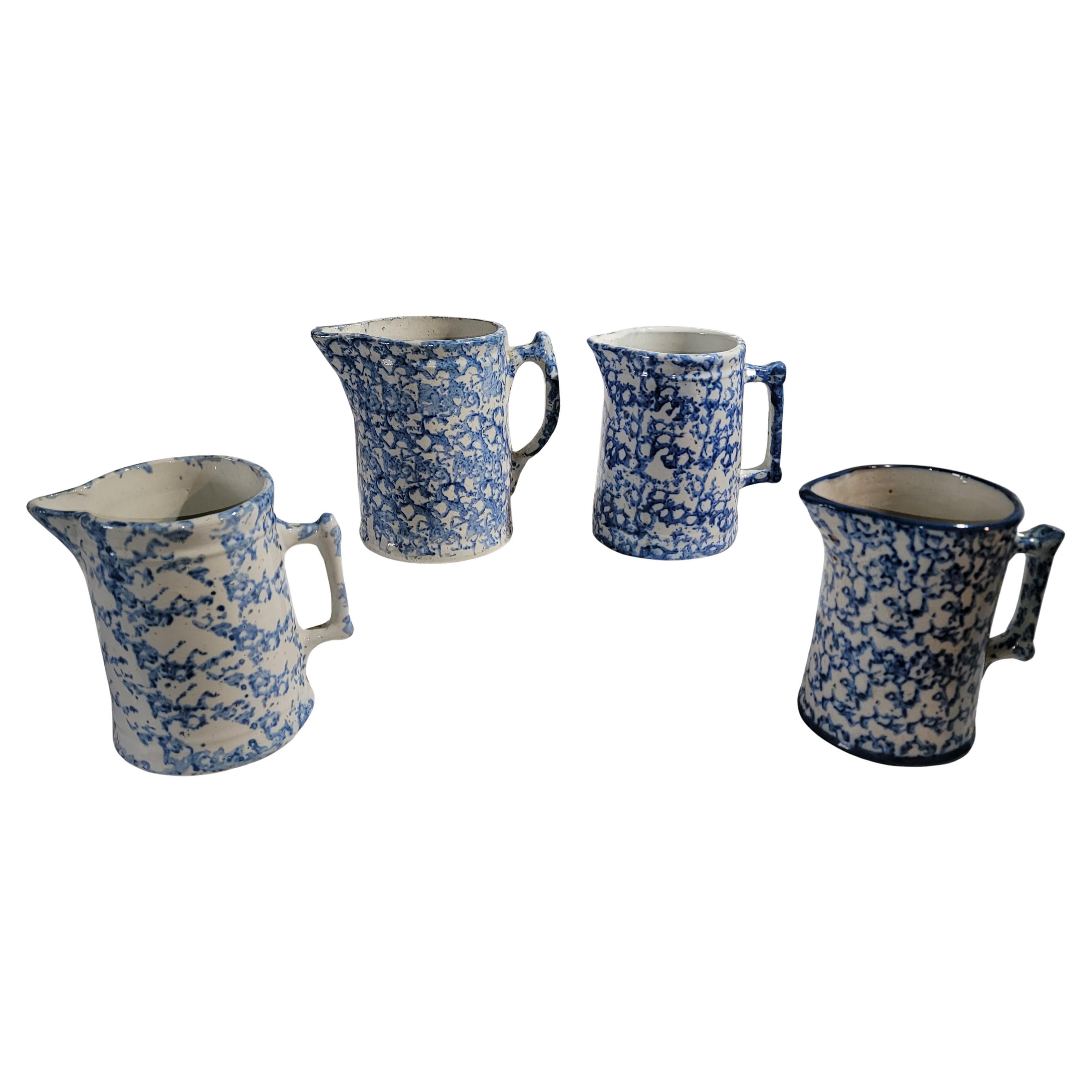 Set of four 19thc Sponge Ware Pitchers