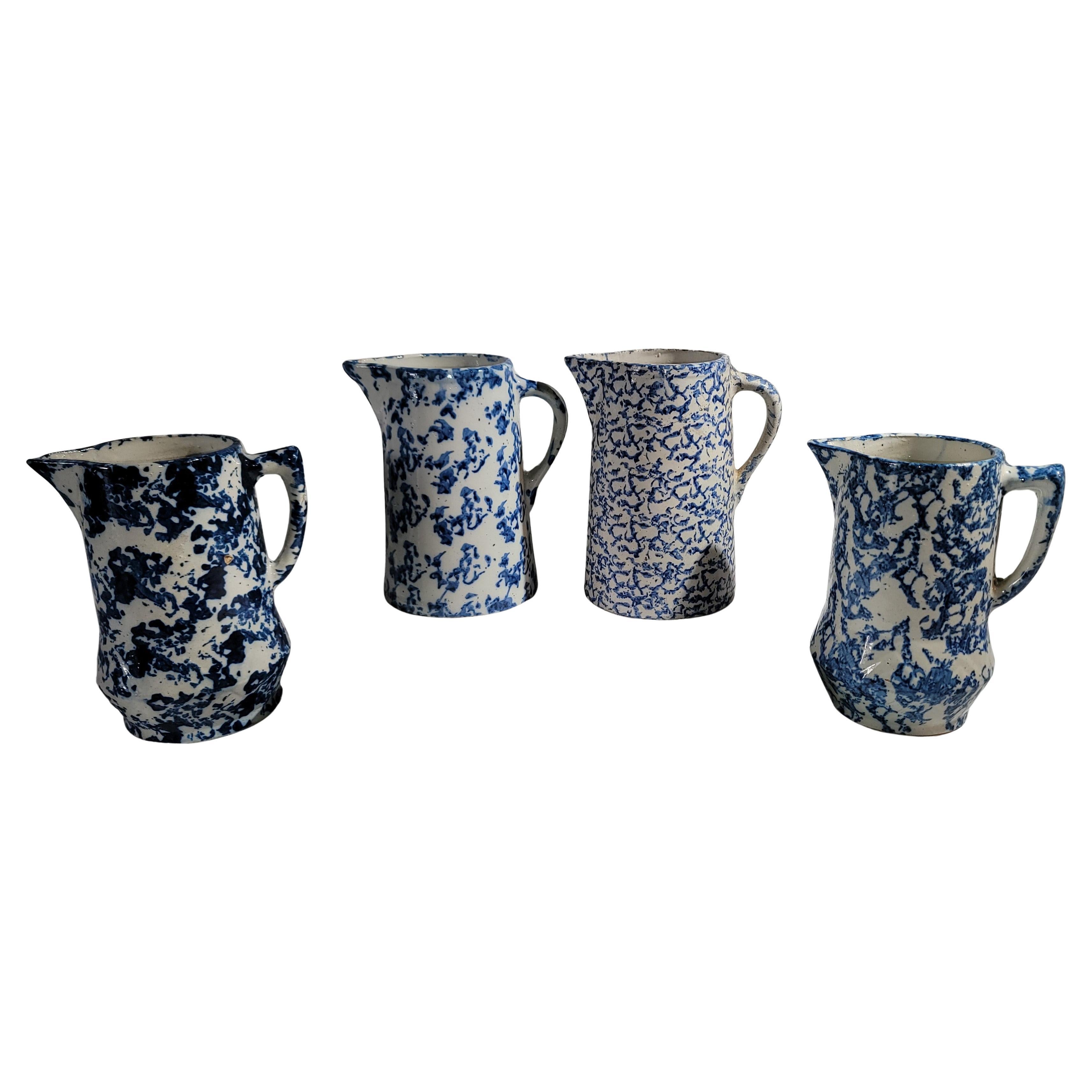 Set of Four 19thc Spongeware Pitchers