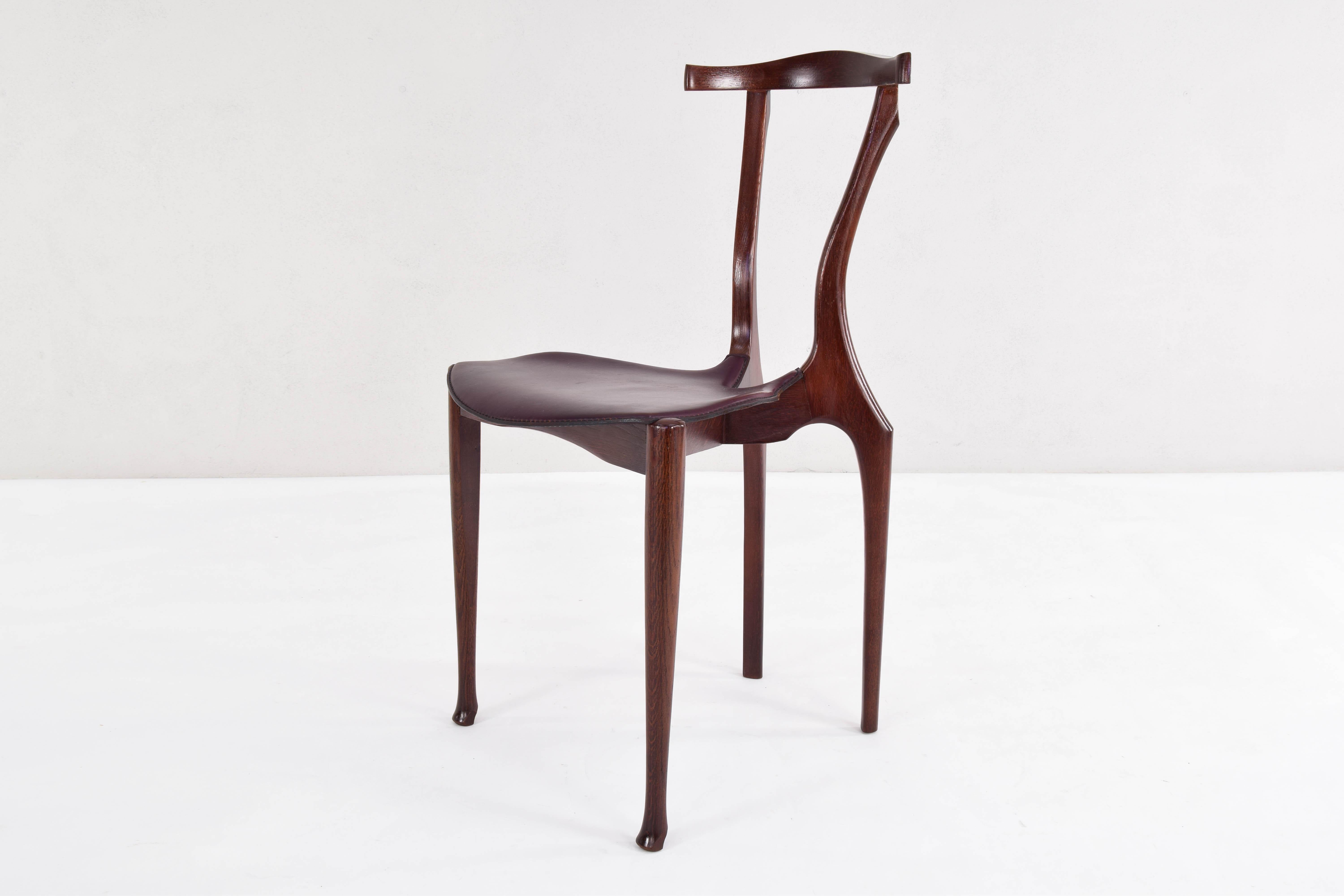 20th Century Set of Four First Edition Oscar Tusquets Gaulino Oak and Leather Chairs by Jané