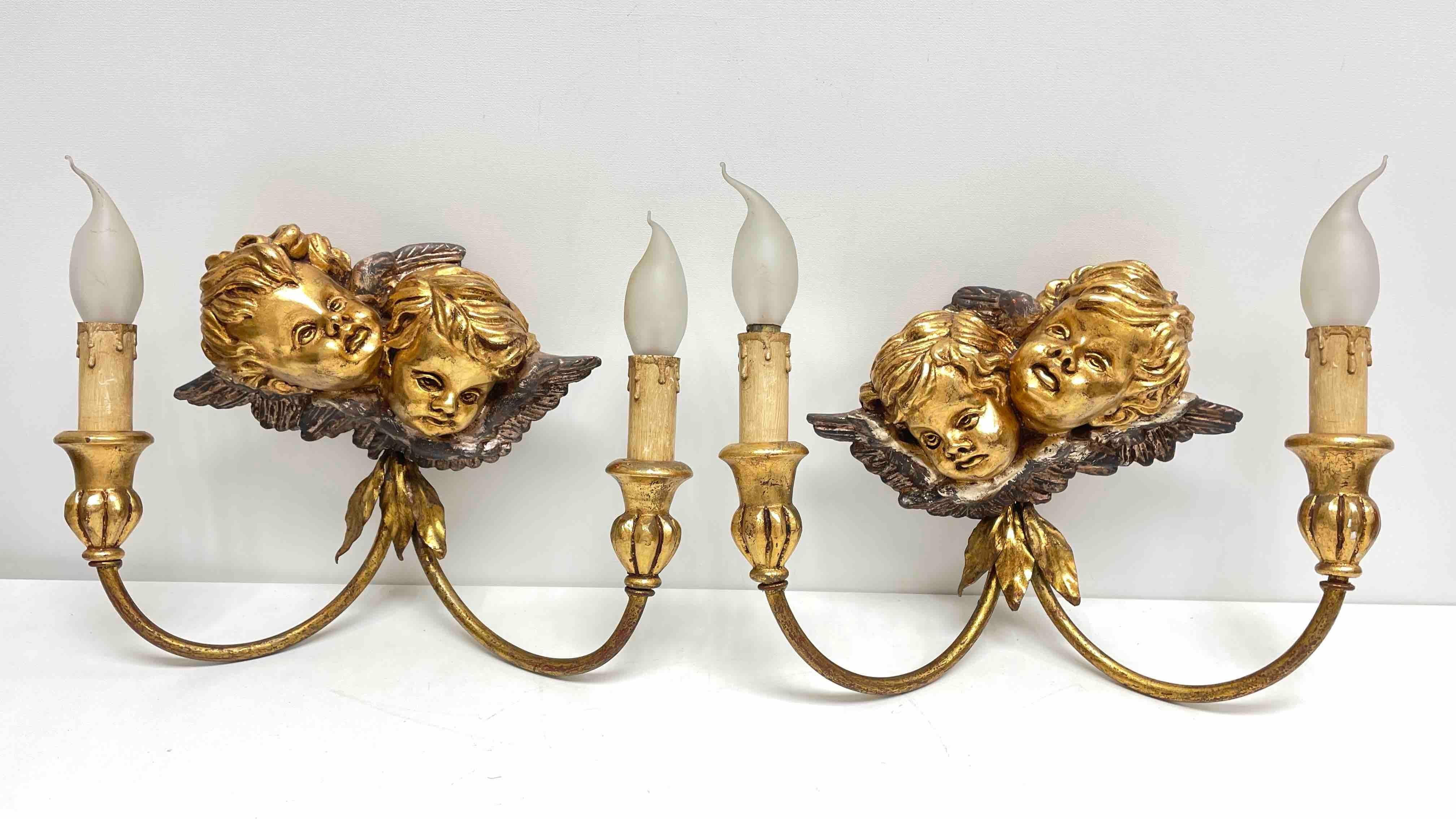 Hollywood Regency Set of Four 2-Light Tole Sconces Cherub Angel Heads Gilded Metal, Italy, 1960s For Sale