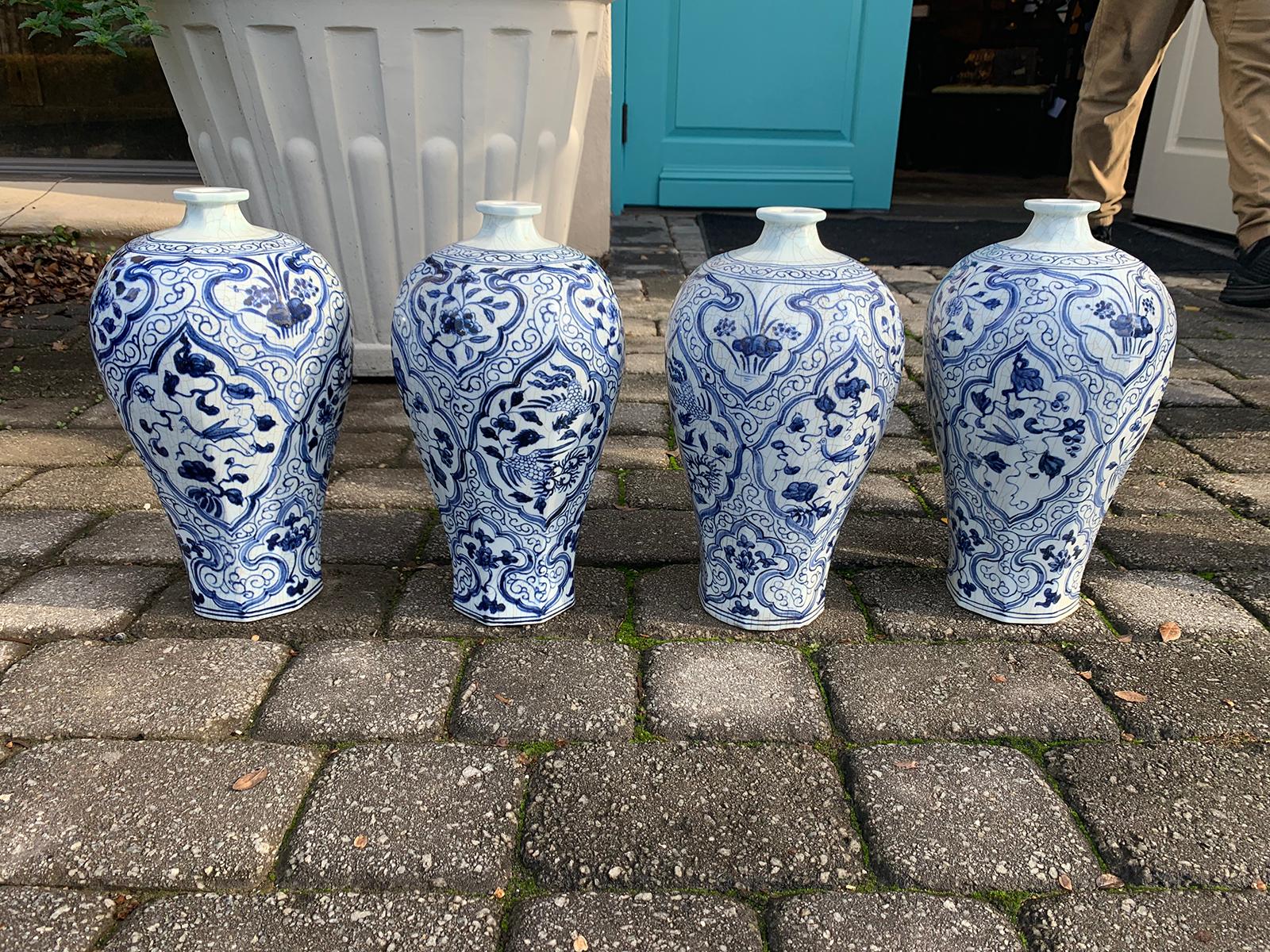 Set of four 20th century blue and white porcelain vases.