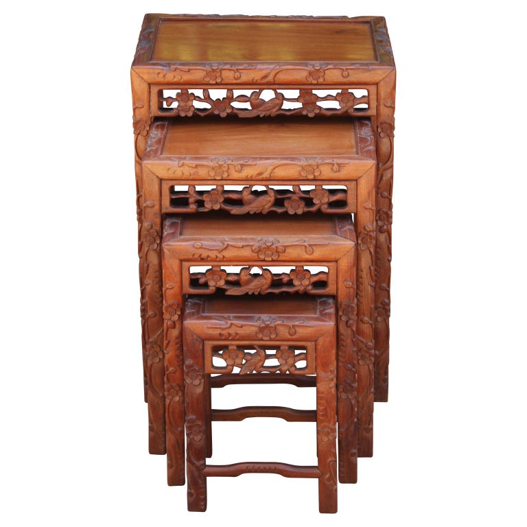 Set of Four 20th Century Carved Chinese Nesting Tables with Fancy