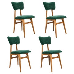 Ensemble de quatre chaises en velours vert foncé du 20ème siècle, années 1960