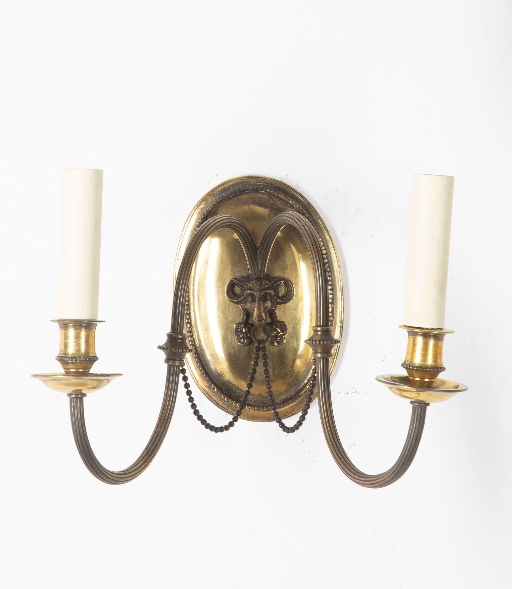 Lovely 20th Century lacquered brass and bronzed wall sconces, with nicely cast rams head, and chain swags.
Good scale. Fully rewired including mounting clips.