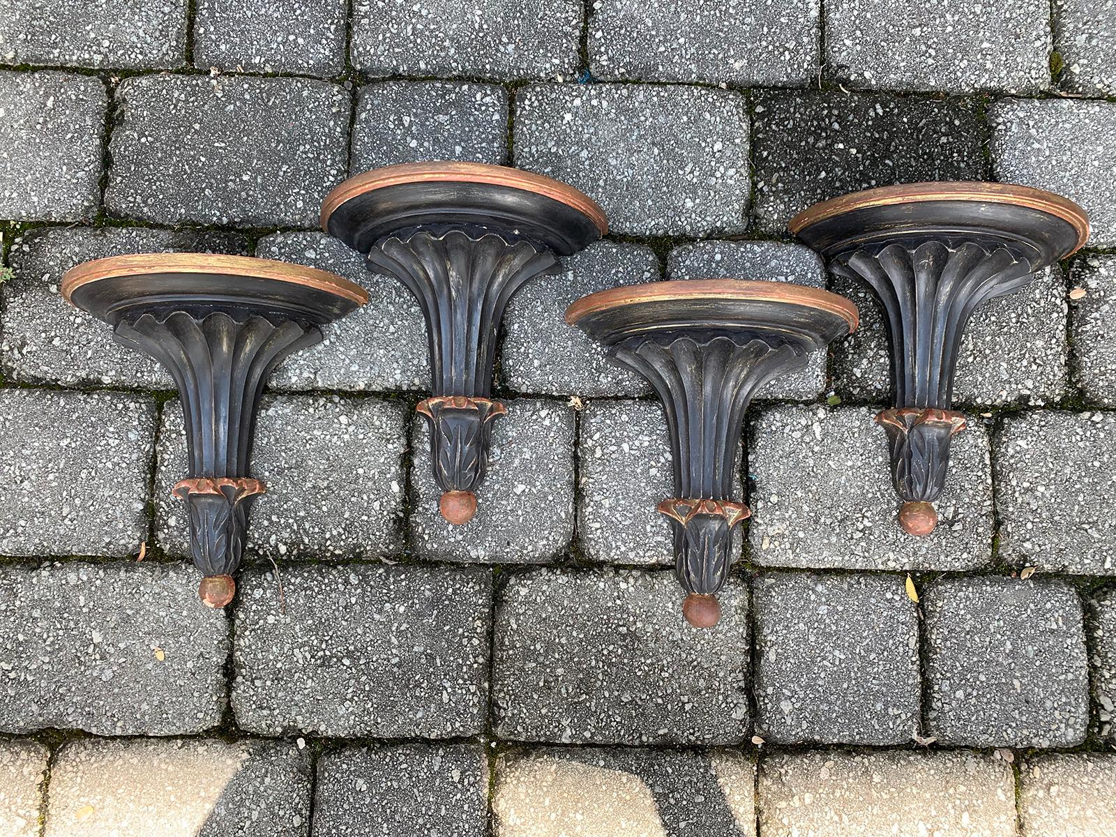 Set of four 20th century Italian painted brackets with acanthus leaves detail.