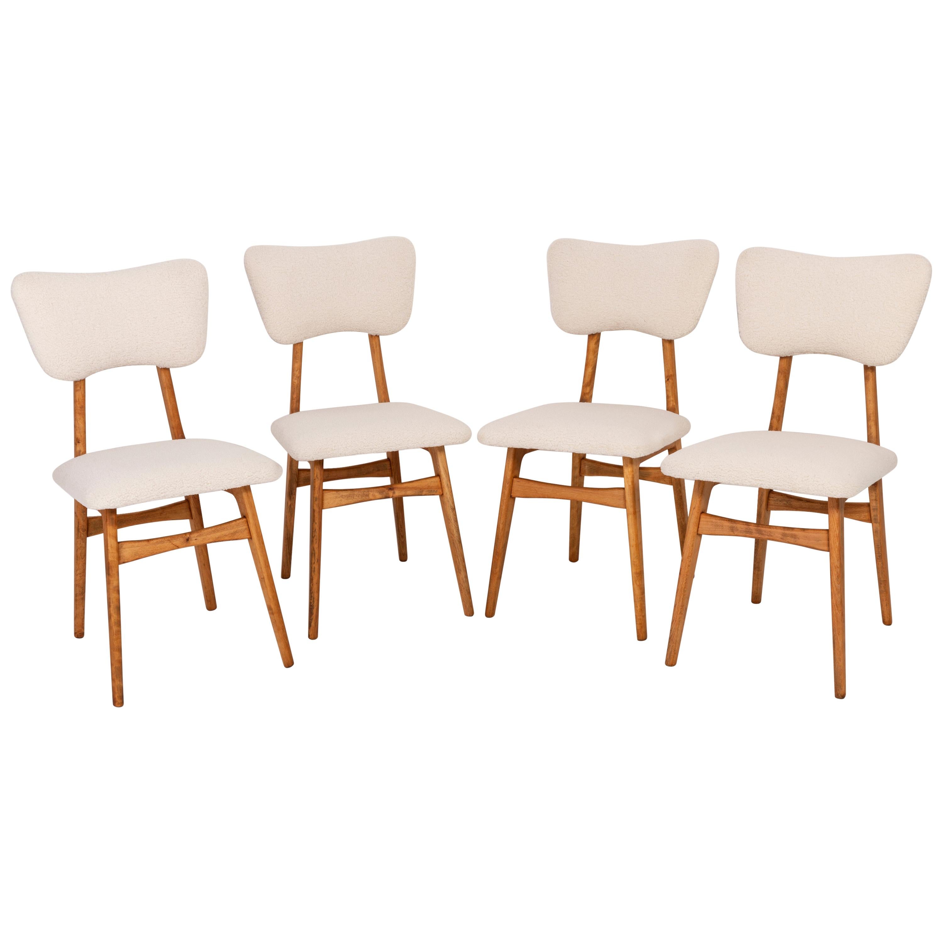 Ensemble de quatre chaises en boucle de crème légère du 20e siècle, 1960