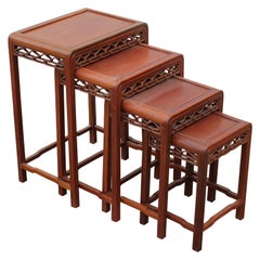 Vintage Set of Four 20th Century Modern Carved Chinese Nesting Tables