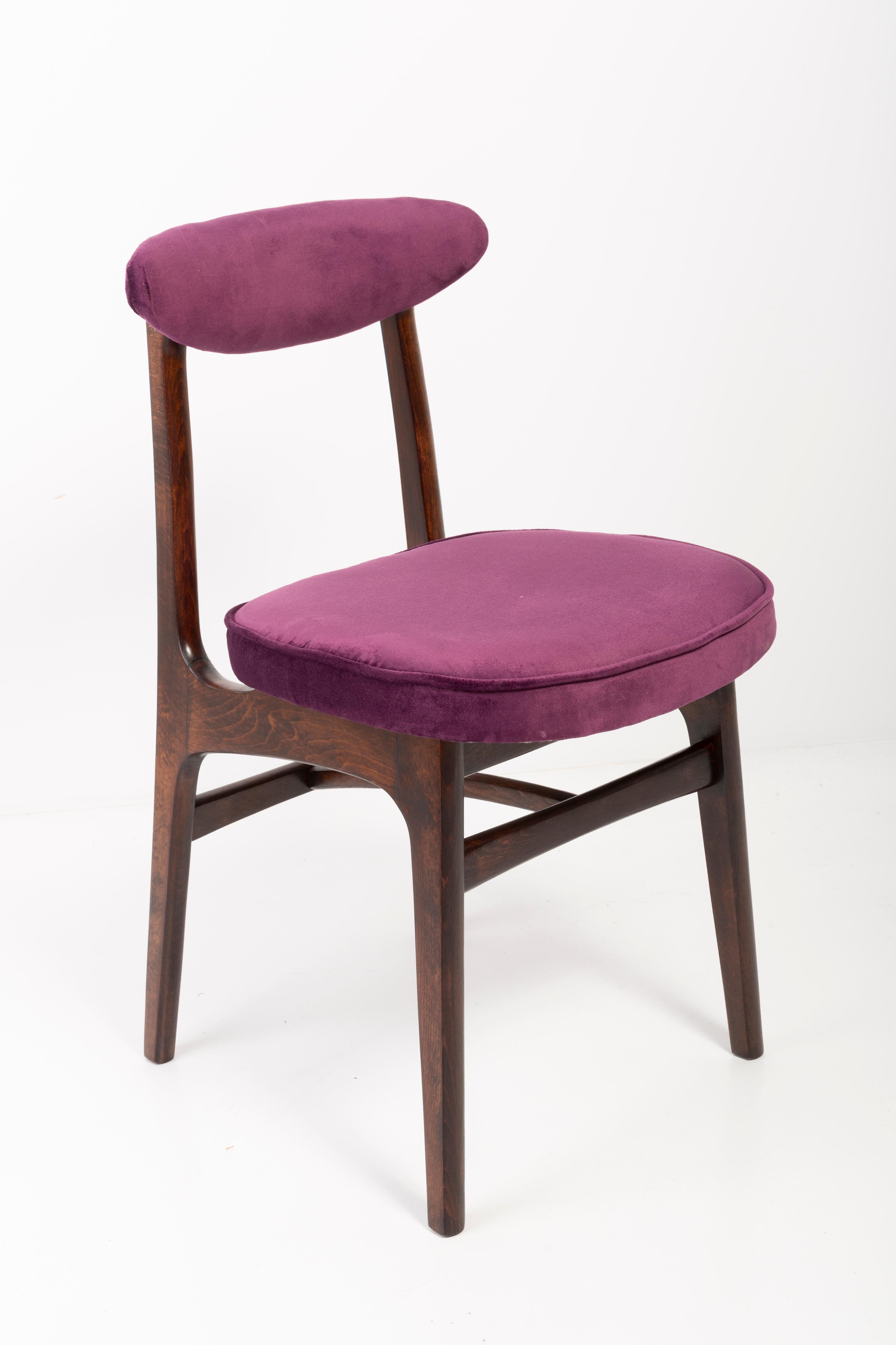 Chairs designed by Prof. Rajmund Halas. It has been made of beechwood. Chairs are after undergone a complete upholstery renovation, the woodwork has been refreshed. Seats and backs were dressed in a plum (color 969), durable and pleasant to the