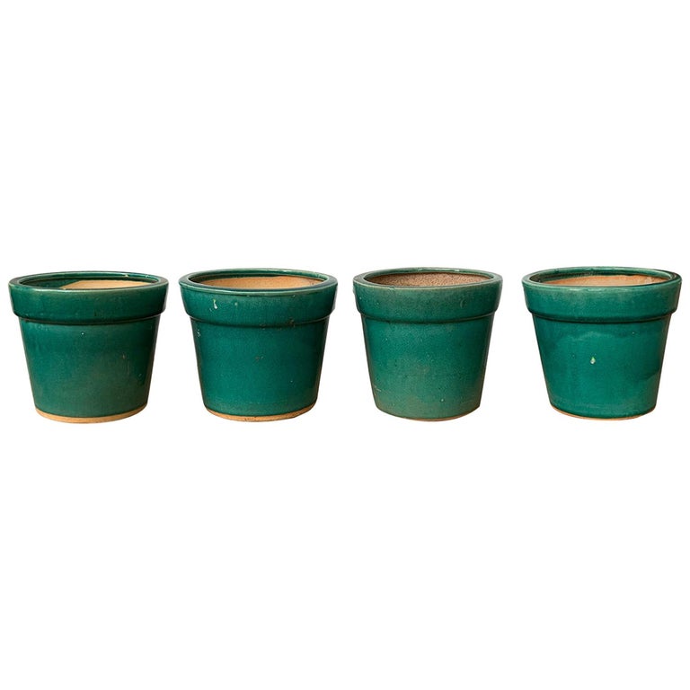 Set of Four 20th Century Turquoise Blue Green Glazed Pottery Flower