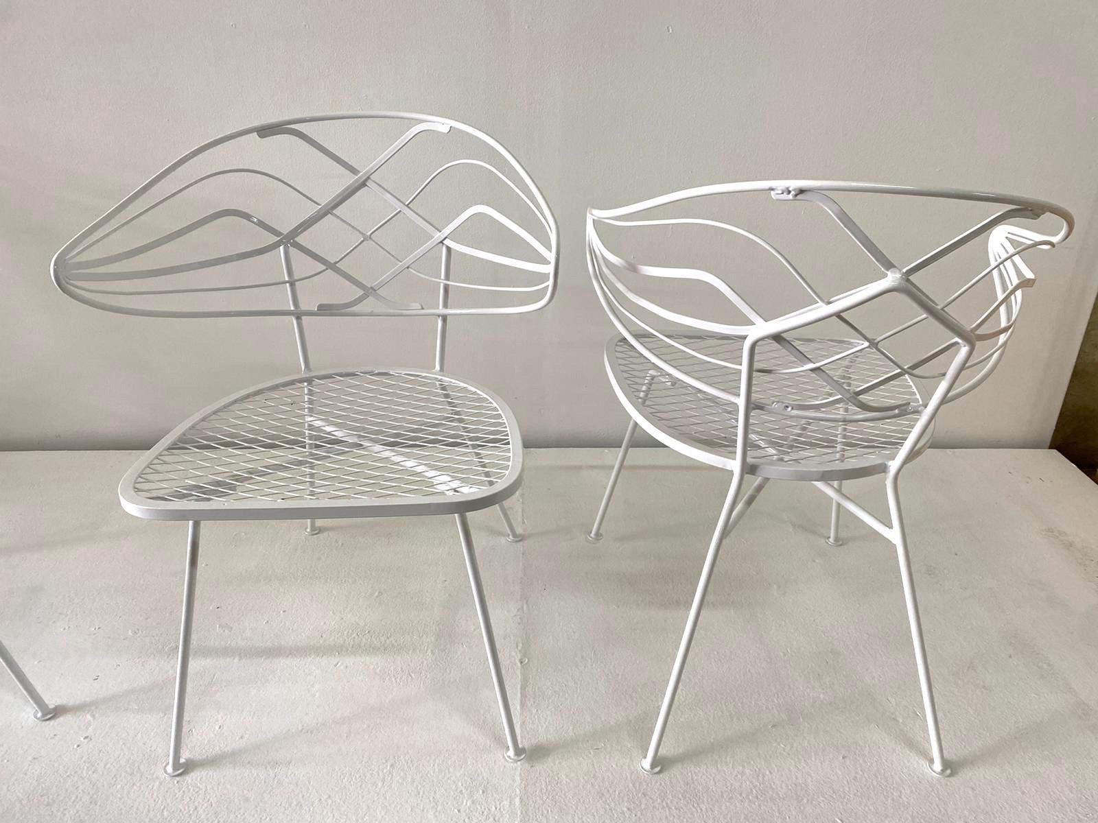 Four wonderful Klismos style curve back chairs - newly powder-coated. Chic in style and great Summer lounge chairs.