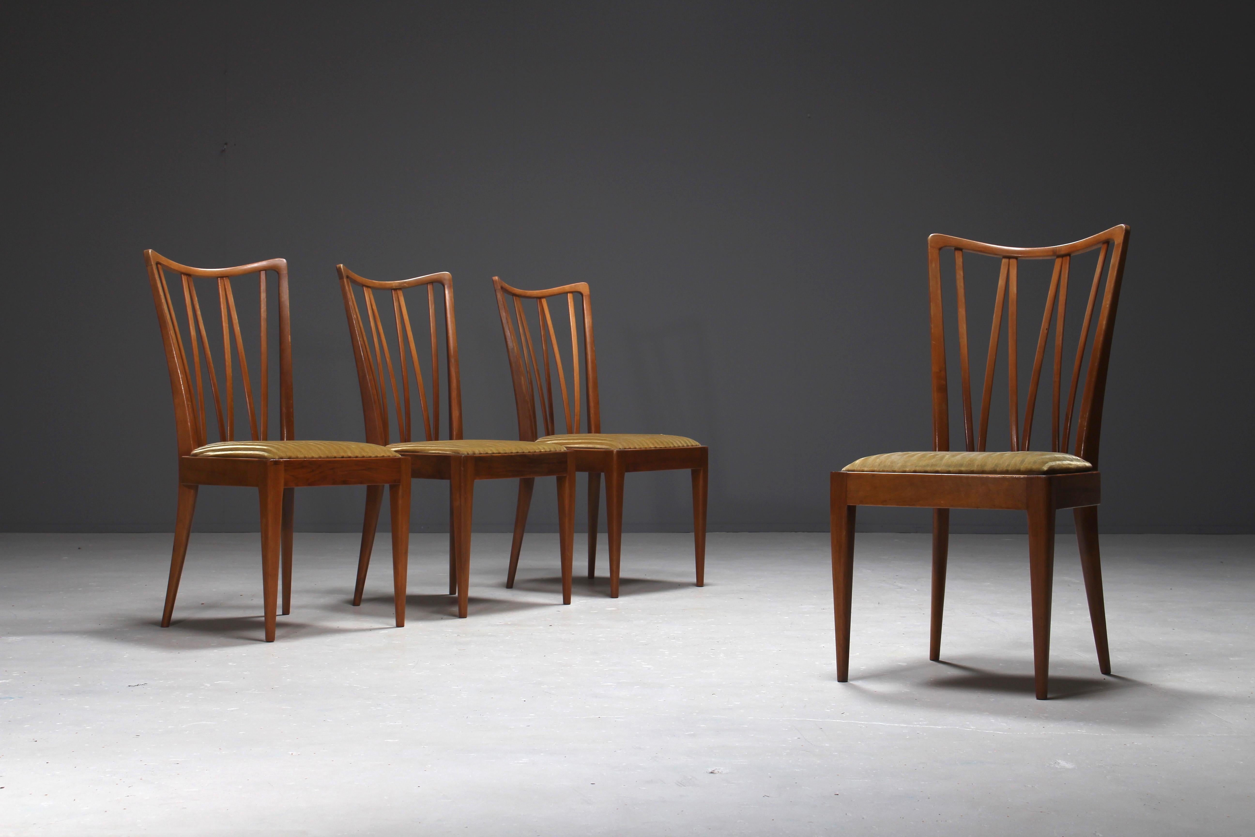 Set of four dining chairs designed by Abraham A. Patijn for Zijlstra Furniture in the Netherlands.
The chairs are made out of walnut and are upholstered with the original velvet.
This design is similar with chairs from Ole Wanscher, Paolo Buffa