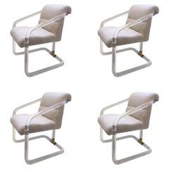 Set of Four Acrylic and Brass Chairs by Lion in Frost