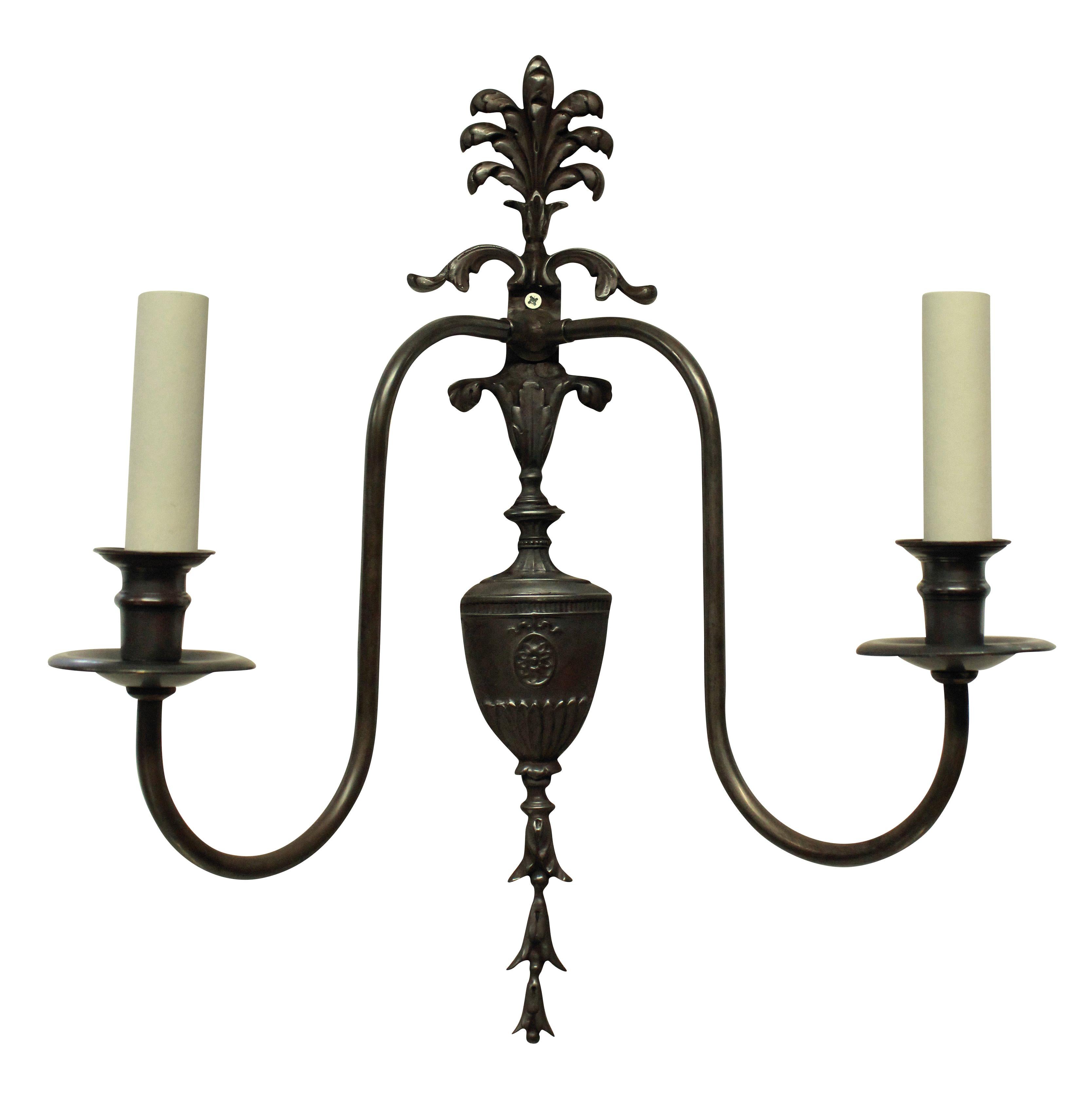 A set of eight English Edwardian Adam style bracket twin branch wall sconces in bronzed brass. Four more available.